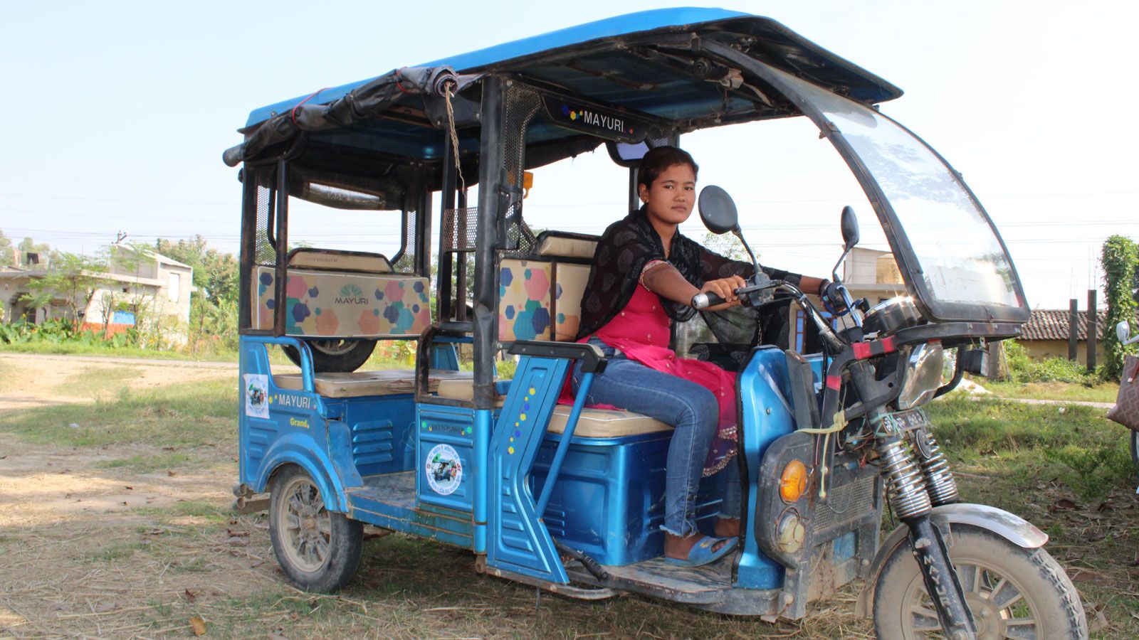 Girl in tuktuk